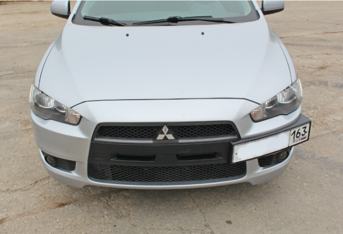 Рамка под номер на передний бампер для Mitsubishi Lancer X (2007-2016) купить недорого с доставкой в Баган